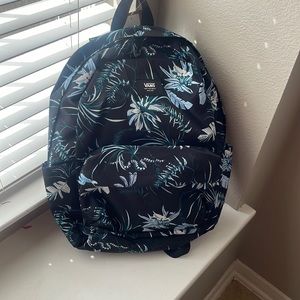 Black and blue floral Vans backpack